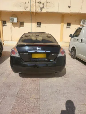 نيسان التيما 2009 مستوردة أمريكياً، صالون سيدان، أسود، مواصفات مميزة، مرخصة