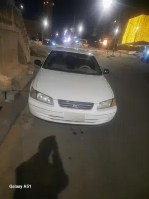 كامري مديل 2001 ،  4 سلندر للبيع اللون ابيض لقطه للمميز قير مكينه بجاله جيده نرجو قرأه الاعلان عدل .