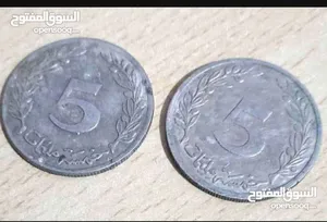 عملة نقدية من فأة 5 فرنك 10 قطع و قطعة 1 فرنك