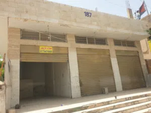 مجمع تجاري للبيع في عين الباشا حي الفروسية فقط 155000