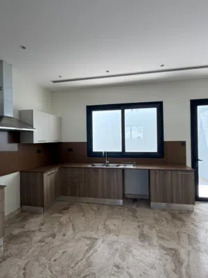 Kitchen set with extractor hood from Hassan Hashmani kitchen brand in oman