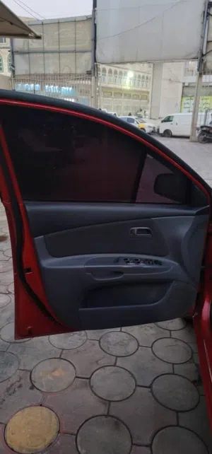 سياره كيا برايد موديل نظيف لون احمر
