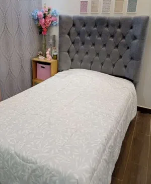 Grey twin bed with mattress included