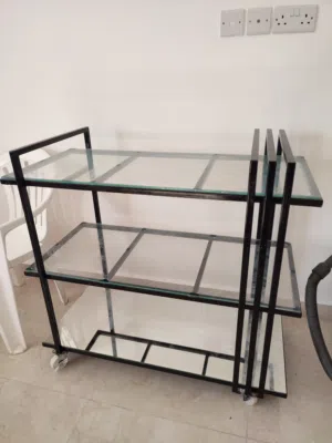 طاولة تقديم طابقين اللون اسود مع زجاج glass table