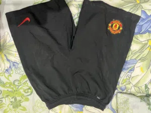 Manchester United Home and away t shirts + shorts