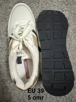 Decluttering used shoes.