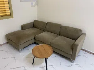 Comfortable sofa with round table
