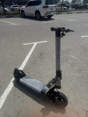 Black New electric scooter blue lights and blue rims (negotiable)(needs new controller)