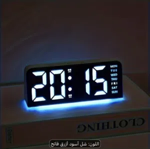 ساعه رقميه ب اضائه زرقاء جديده ب الكارتون. و بدون اي استعمال