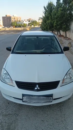 ميتسوبيشي لانسر اعلى صنف موديل 2012 وارد خليج فحص كامل ماتور 1003 اسود فور جي اصلي واقتصادي