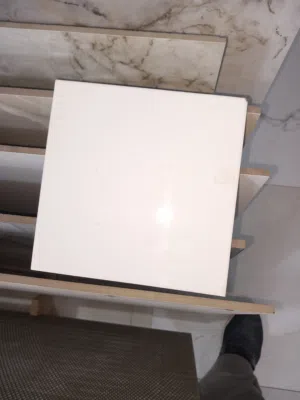 بورسلين ايطالى لون ابيض 40×40 أرضية خارجى وبوستين اسبانى 45×45 لون بيجى وارصاصى على 38