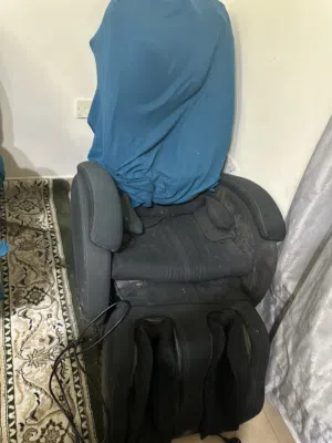 كرسي مساج بالكهرباء