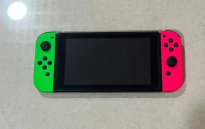 Nintendo switch Bundle 4 joycons 15 games