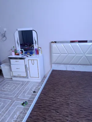 bed and metres . kabad ..dressing table