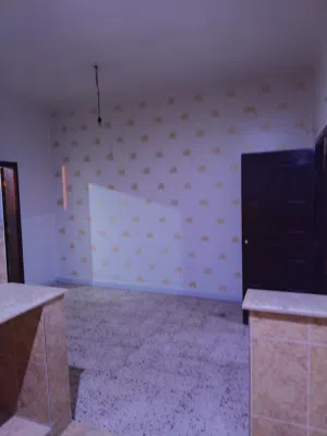 شقه للايجار أبو سليم خلف عمارت حي إنتصار طريق المطار  شارع جامع حمزة بن عبدالمطلب