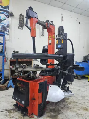ماكينة خلع وتركيب إطارات سيارات (Tire Changer) نوع John Bean T6000 بلد الصنع إيطالية