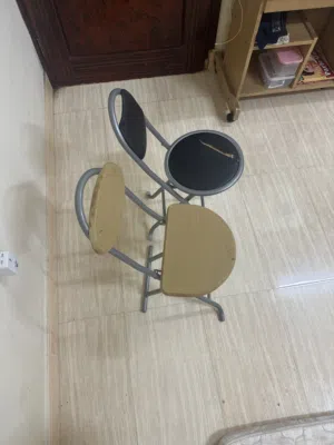 Foldable two chairs for two riyals