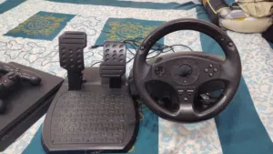 Thrustmaster Stering wheel with 2 Gaming Cds