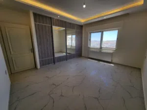 شقة طابقية فارغة للإيجار في دير غبار - ref : 14575