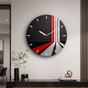 ساعة حائط مودرن دائرية بتصميم هندسي عصري – أسود وأحمر