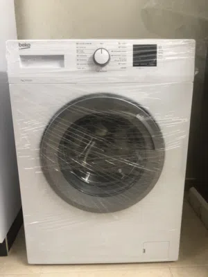 تلاجه وغساله 7كيلو