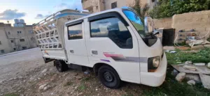كيا دبل كبين لون ابيض فحص ممتاز عجال جاد بطارية جديدة جير ممتاز اكسات ممتازة