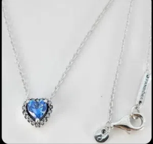 I'm selling my original Pandora sterling silver necklace with a beautiful blue heart pendant.