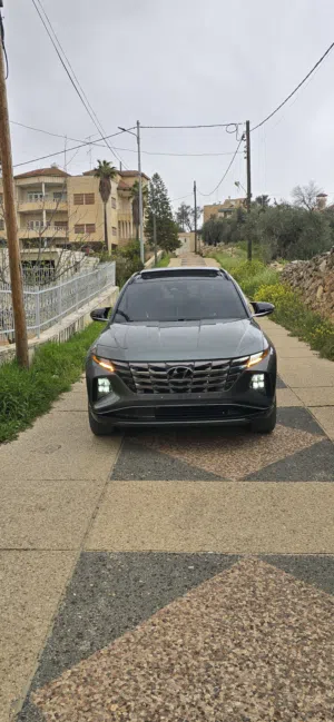 هيواندي توسان هايبرد 2022 منمر فل الفل اضافات بحاله الوكاله دفع رباعي 4x4