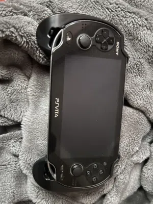 Trading new unused ps vita black modded with custom grips for any PlayStation or Xbox modded console