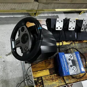 عرض لعشاق ألعاب السباقات  للبيع دركسون PXN V9 بحالة ممتازة جدًا + يد سوني 4 استخدام نظيف.