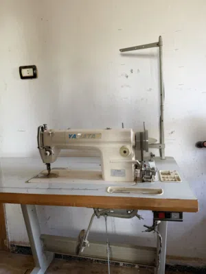 ماكنة خياطة ومنسوجات متوسطة
