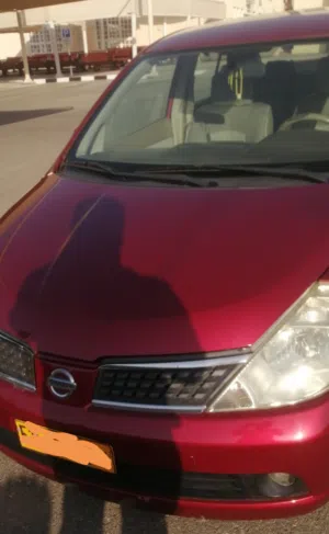 Nissan TIiDA 2008, 1000