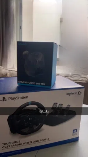 من شركة Logitech G923 +shifter معه قير