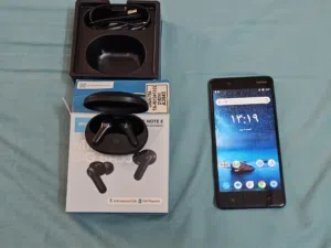 Nokia 8 phone with Bluetooth earphones