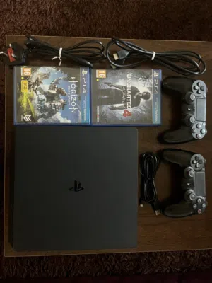 PS4 Bundle  Like New Condition  2 Controllers + 2 Games + Box