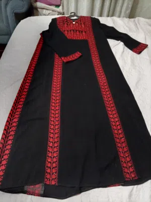 ثوب تطريز ثقيل