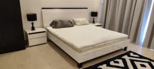 King size bed (white) with side tables, mattress, table lamps and a carpet - @ 80% discount