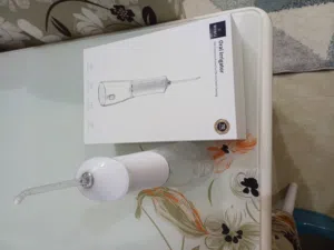 oral irrigator جهاز تنظيف الأسنان بضغط الماء