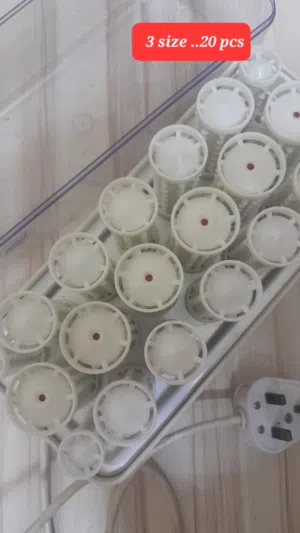 20 pcs electric hair rollers, likely a Clairol Style Setter, used for styling