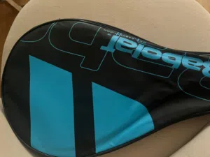 Padel racket with cover