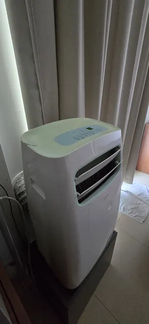 Midea . 0 - 1 Ton . Used4