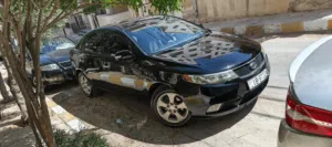 كيا فورتي 2009 صالون 3جيد واحد ضربه راس  فل الفل بصمه وفتحه مدهونه جديد