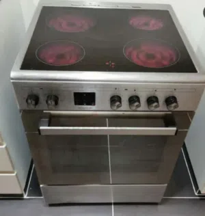"4-burner electric cooker/range in good condition. All ceramic burners are fully functional, but the