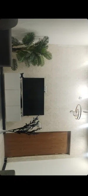 ميز تلفزيون تعليك