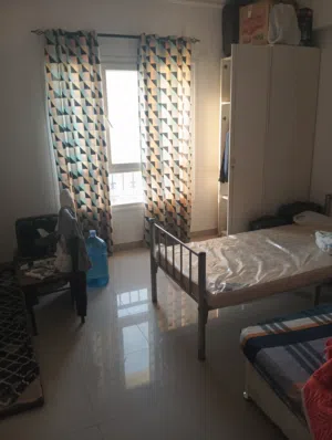 Sharing Room (already 2 people are there and you have to share with them)
