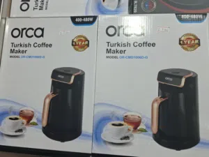 ماكينة تحضير القهوة التركية من أوركا (Orca)، موديل OR-CMD1006D-G.تتميز هذه الماكينة بتصميمها المدمج