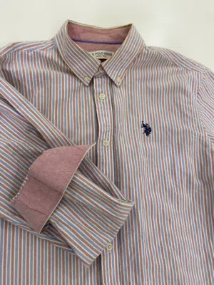 قمصان polo
