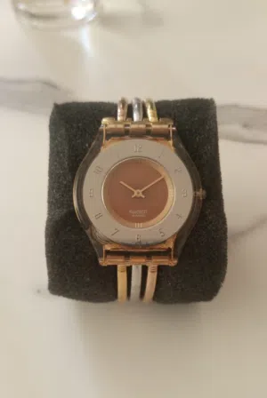 swatch gold original like new