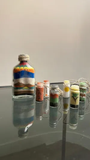 فن الرمل داخل الرجاج