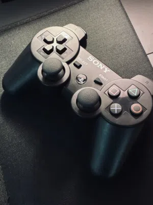 PlayStation 3 controllers-black and red